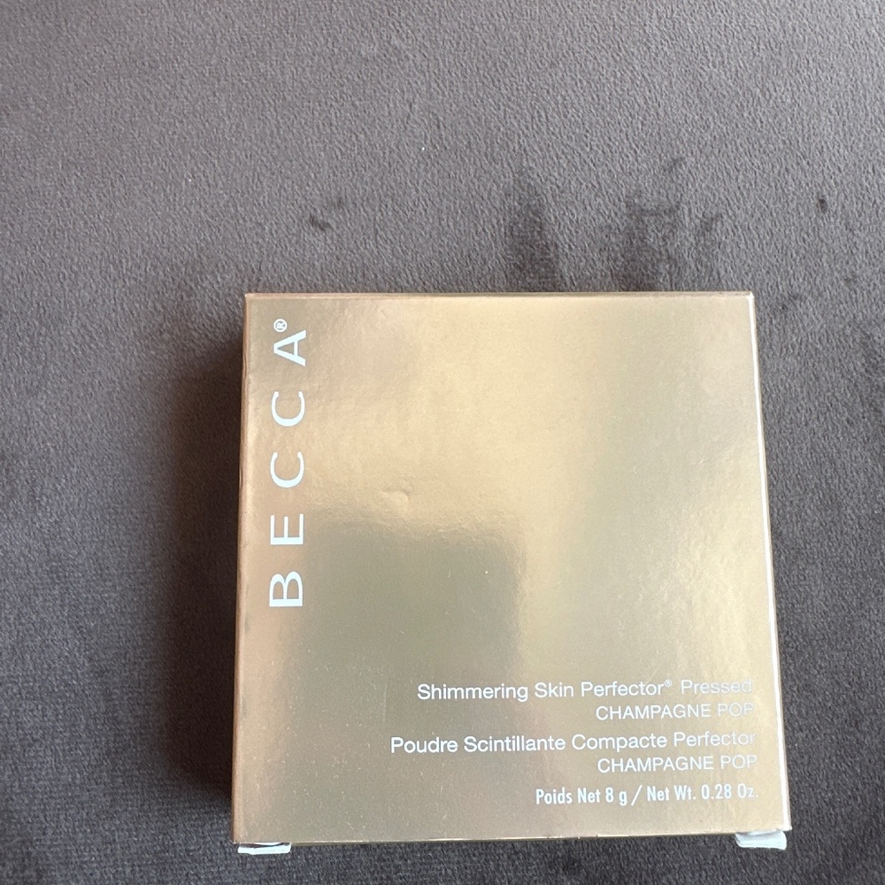 Becca shimmering skin perfect or in champagne pop.
